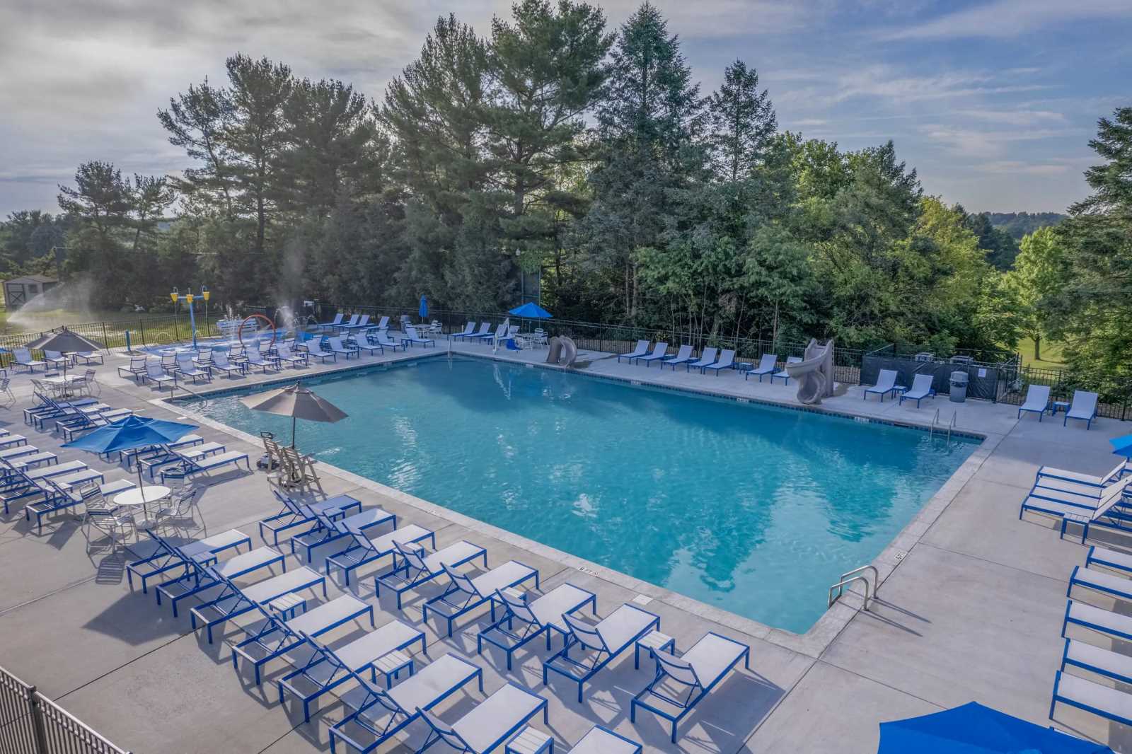 Swimming Pool with Chairs on the Deck